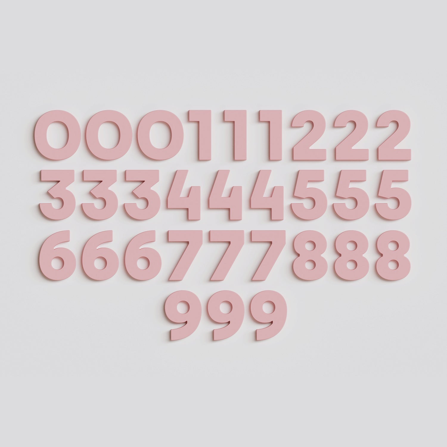 Full set of 30 blush Wordbits number magnet letters and symbols laid out neatly on a grey background