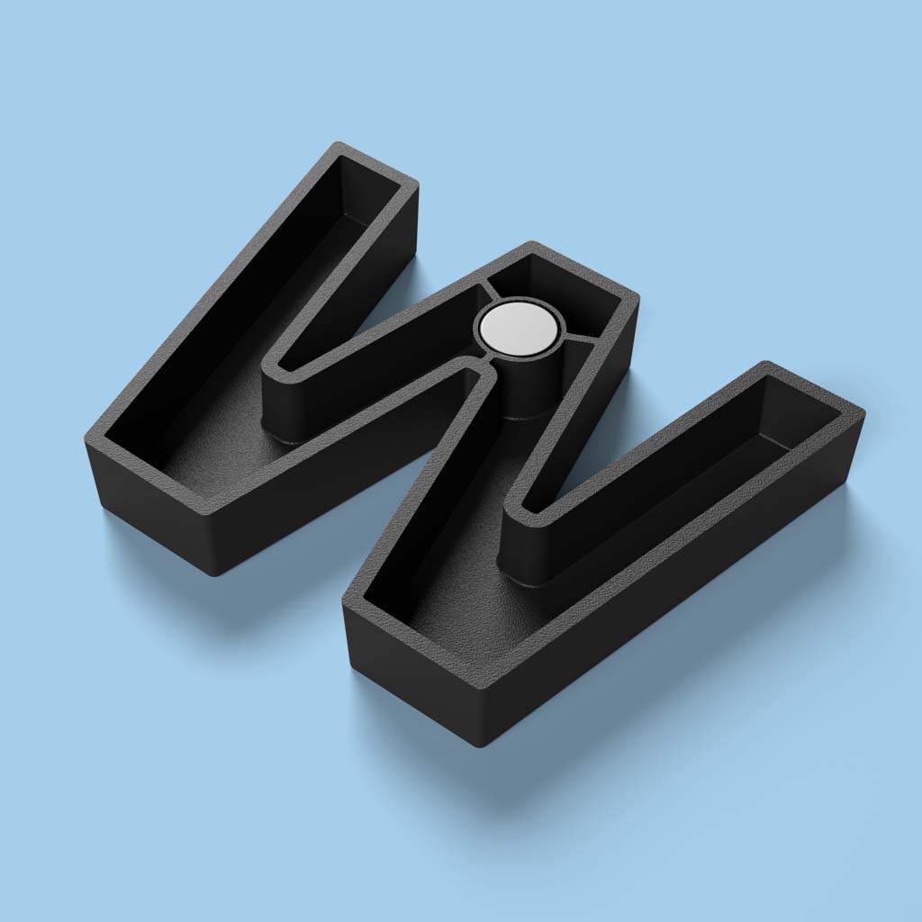 back view of a black letter W strong alphabet letter with neodymium rare earth magnet